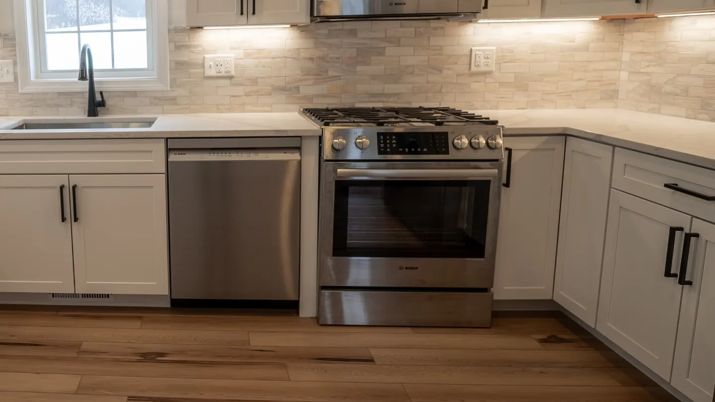 Custom granite countertop edge detail in a New Hampshire kitchen — Precision Granite Works