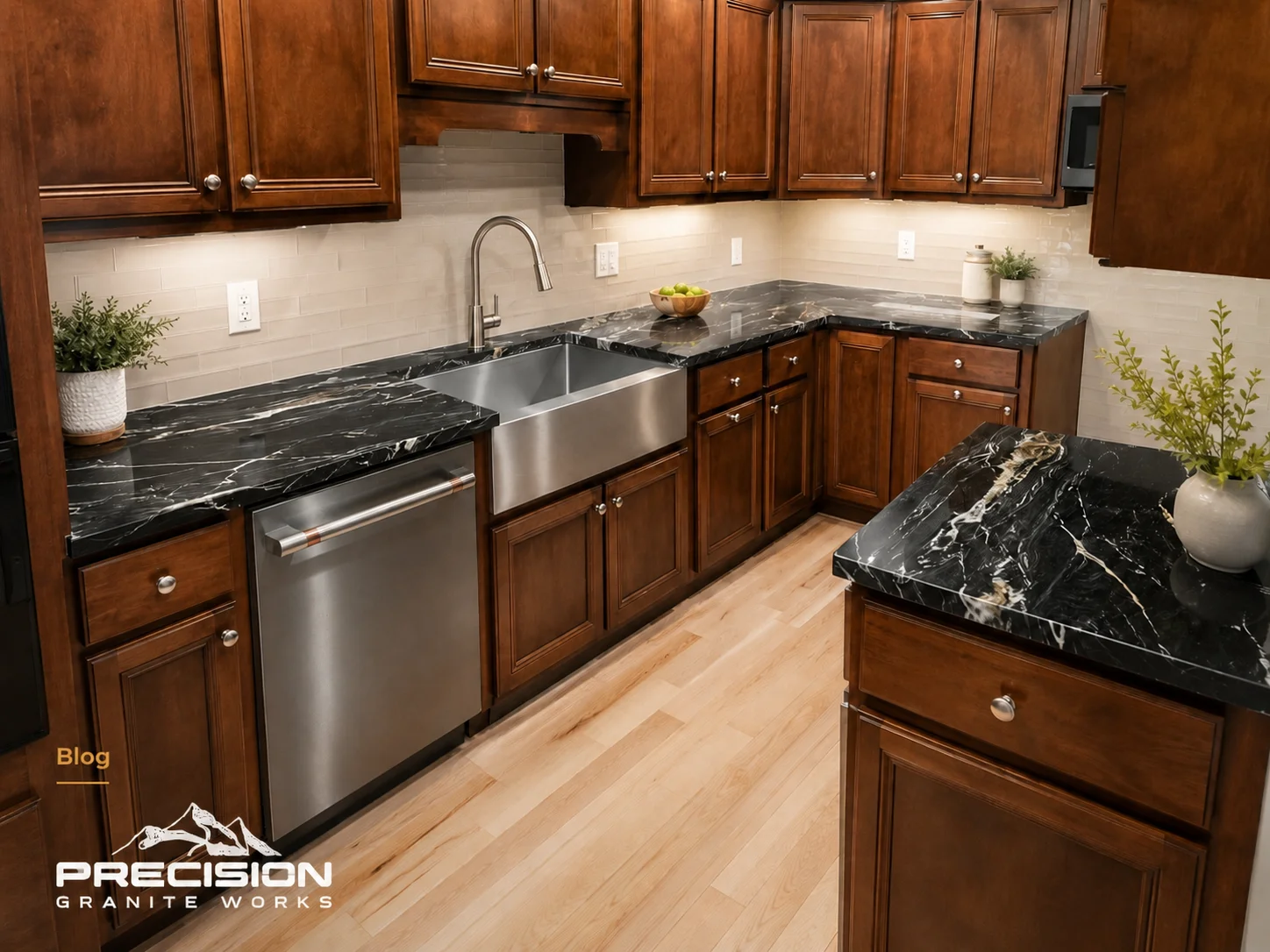 Quartzite kitchen countertop with natural veining, fabricated and installed by Precision Granite Works in a Concord, NH home