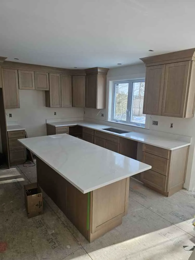 White quartz countertops with consistent color in a new NH kitchen build