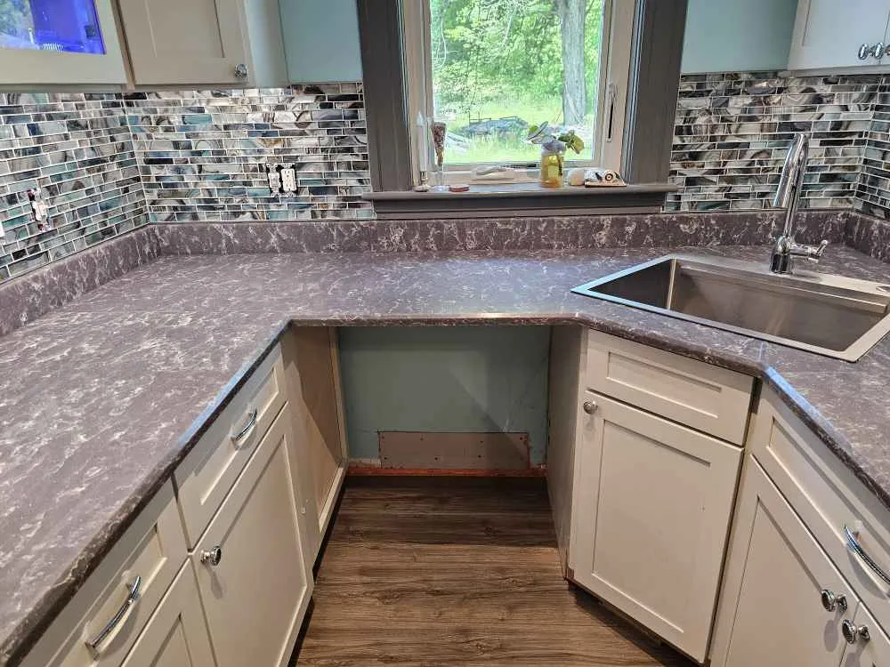 Pietra Grey quartz countertop with deep grey veining in a Franklin, New Hampshire kitchen