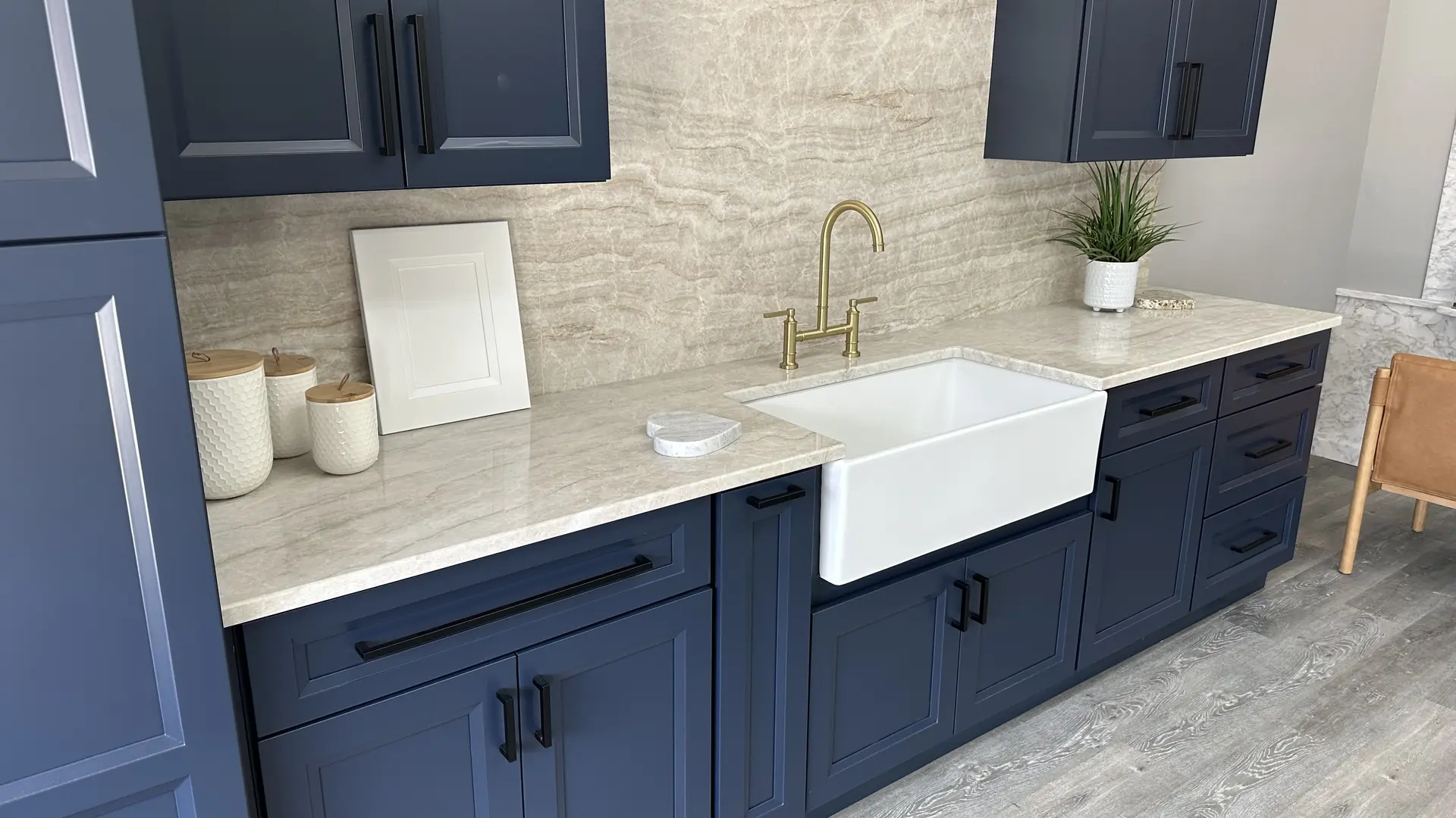 Quartzite countertops with bold natural veining in a New Hampshire kitchen