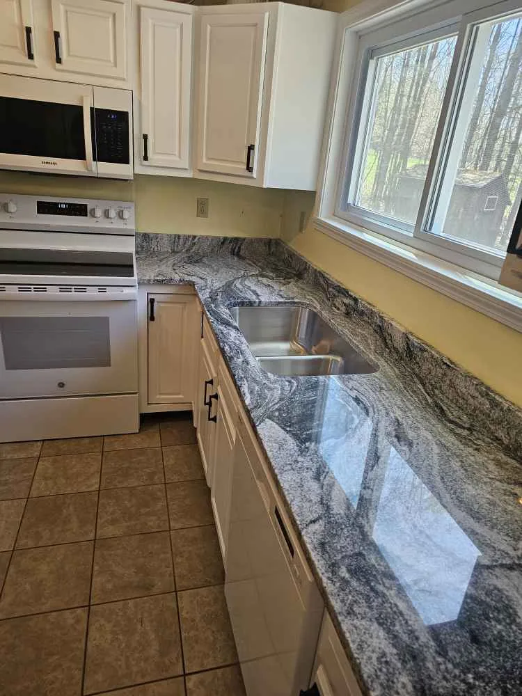 Silver Cloud granite kitchen countertop in a Bow, New Hampshire home.