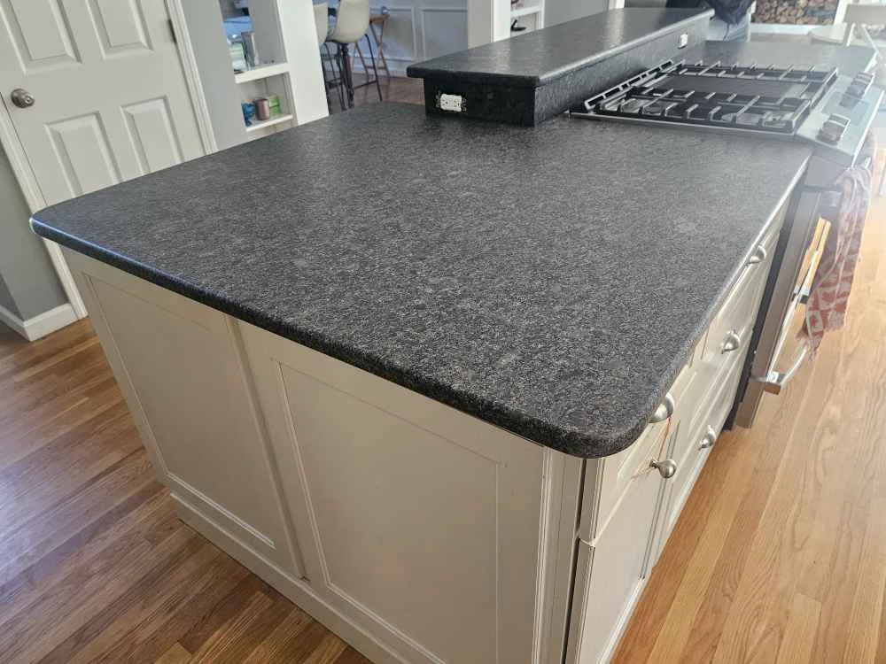 Silver Pearl granite countertop with a leathered finish in an Exeter, New Hampshire home