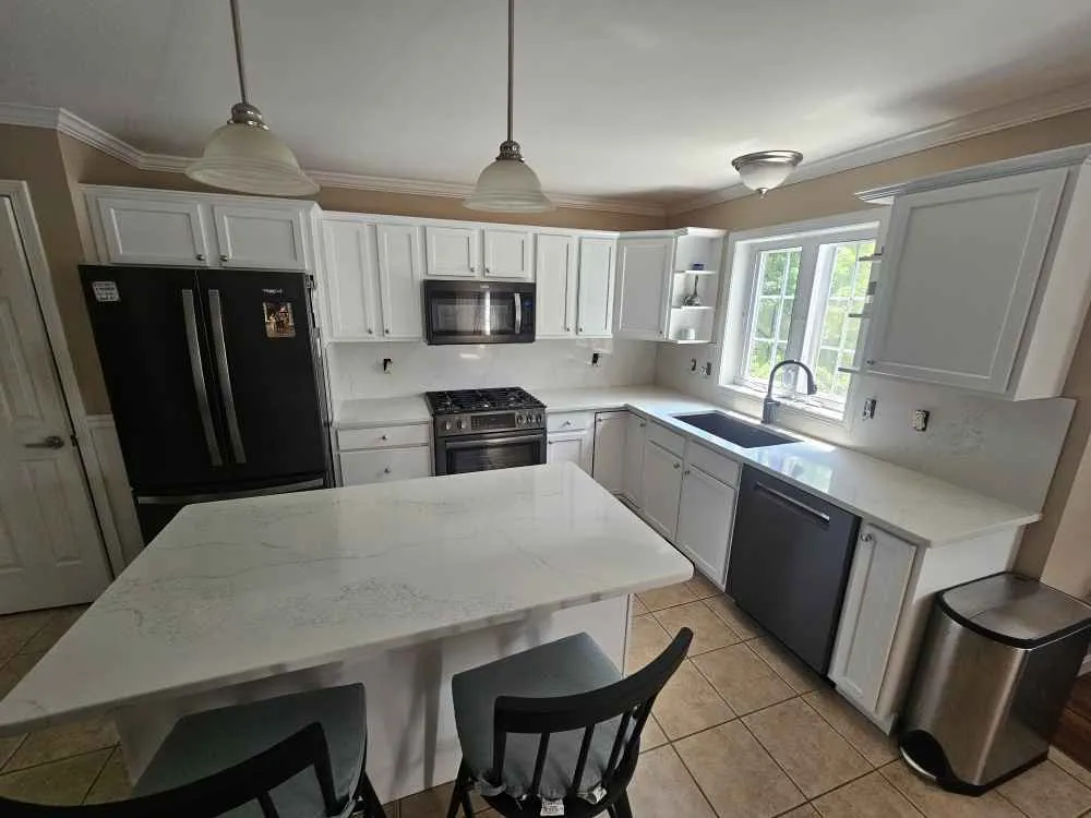 Venato Silver quartz kitchen island with waterfall edge in a Dover, New Hampshire home